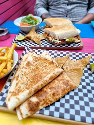 Torta chorizo and gringa milanesa and fries at Pura Vida Vegan Tacos in Antwerpen