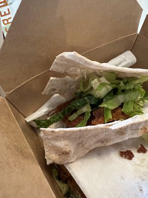 Vegan chicken wrap (Partially eaten)  at The Vegan Joint in Woodland Hills