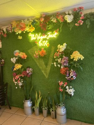Close-up view of the flower wall  at The Vegan Joint in Woodland Hills
