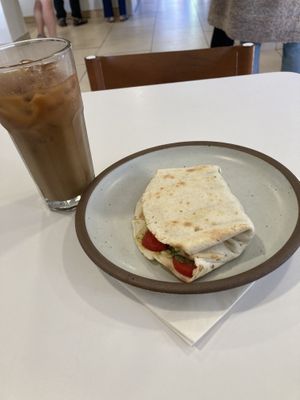 Vegan Just Egg toasted breakfast wrap and iced coffee with oat milk. Delicious!  at Casa Blanca Coffee Roasters in Wilmington