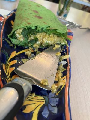 Inside of the vegan version of the Thai pizza. Ice cold in the inside. Would not recommend   at Tina's Garden Gourmet Cafe in Hilo