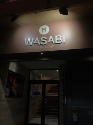Wasabi restaurant entrance on street and go upstairs at Wasabi in Saint-denis