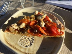 Amazing pizza with a really good vegan cheese, eggplant and bellpapper.  at Les Escales in Sant Cugat Del Valles