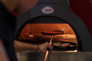 Pizza baked with open fire  at Pizzeria Portofino in Lübeck in Luebeck