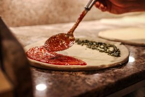 Pizza Italia is made  at Pizzeria Portofino in Lübeck in Luebeck