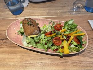 Beyond meat burger with vegan cheese and side salad  at Energetic Life  in Stuttgart