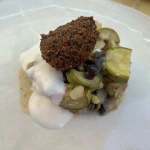 Falafel with almond mayo and seasonal vegetables  at MOM Cucina Vegetale Creativa in Fano Adriano