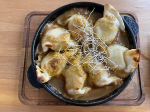 Vegan Pierogi Ruskie with mushroom sauce  at Pod Przykrywką in Wroclaw