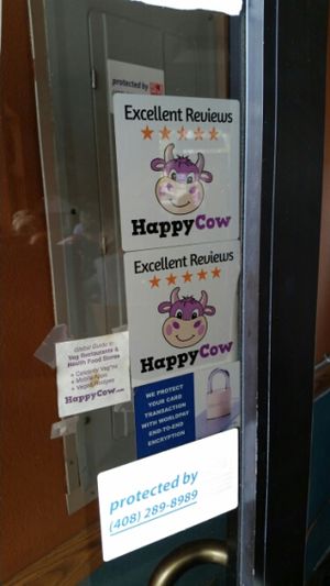 Happy Cow stickers! at Salsas Taco Bar in Santa Cruz