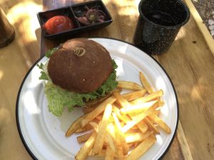 Gaia burger, fries, and agua del día.  at Planeta Veggie in La Paz