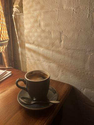 Black coffee  at Cinnamon & Co in West End