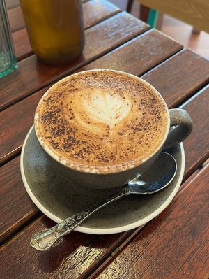 Cappuccino with oat milk  at Cinnamon & Co in West End