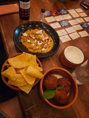 Arancini and cheesy corn dip thing at Cinnamon & Co in West End