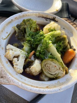 Roasted baby vegetable nabe - amazing soy, garlic, yuzu and scallion vegan broth.  at CanoeHouse in Waimea