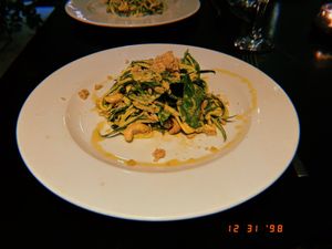 zucchini noodles in I believe a tahini dressing, cashews, dates, spinach, fresh herbs at Crucina Restaurante in Madrid