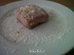 raw vegan strawberry cake, with a nutty base at Crucina Restaurante in Madrid