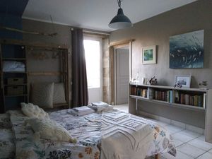 The Clain - ground floor bedroom with disabled bathroom at Moulin de la Cueille in Romagne