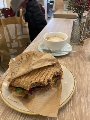 Sandwich with sweet potato and spinach and a cappuccino with oat milk   at Dean & David - Lister Meile in Hannover
