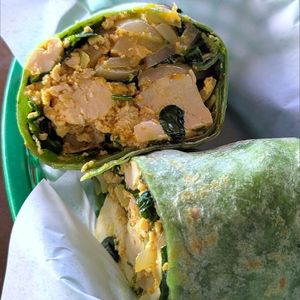 Tofu scramble, available in spinach wrap or over brown or white rice. Very flavorful with lots of turmeric, green and Maui onions, spinach and bell peppers. 🔥 at Ma'alea General Store in Wailuku