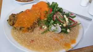 An example of a lunch dish at Govinda's. Veggie patty, quinoa, salad.  at Govinda Lila in Cusco