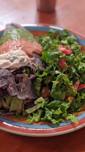 Burrito with salad at Govinda Lila in Cusco