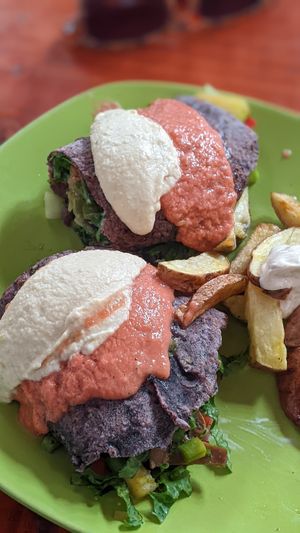 Falafel wrap ( Chica morada tortilla) with side potatoes with delicious sauce at Govinda Lila in Cusco