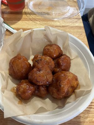 Fried Cauliflower Wings tossed in BBQ saucee  at Trap Vegan in Detroit