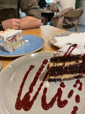 Coconut cake (closest) & plum cake   at Vegan Garden Budapest in Budapest