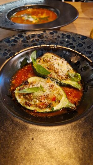 Zucchini stuffed with vegetables, tofu and quinoa at Vegan Garden Budapest in Budapest