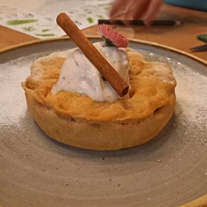 Apple pie with vanilla ice cream.

Slightly too hard dough, but very tasty, and not too sweet at Vegan Garden Budapest in Budapest