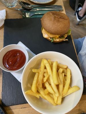 the vegan burger with fries  at Vegan Garden Budapest in Budapest