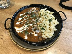 Mushroom stew with hungarian dumplings  at Vegan Garden Budapest in Budapest