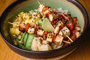 Smoky Peanut Poke Bowl:
Served with sushi rice, pineapple-tofu sticks and seasonal vegetables at Vegan Garden Budapest in Budapest
