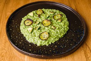 Zucchini green risotto:
Served with vegan parmesan, vegan butter and zucchini texture at Vegan Garden Budapest in Budapest