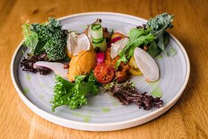 Creamy trio with homemade oven-baked pita:
Pumpkin hummus, zakuska, bean cream,
Optional side dish: pita bread or gluten free tortilla chips at Vegan Garden Budapest in Budapest