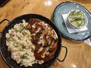 Mushroom Paprikash with cucumber salad at Vegan Garden Budapest in Budapest