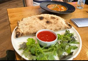 Goulash (top) and calzone (bottom)   at Vegan Garden Budapest in Budapest
