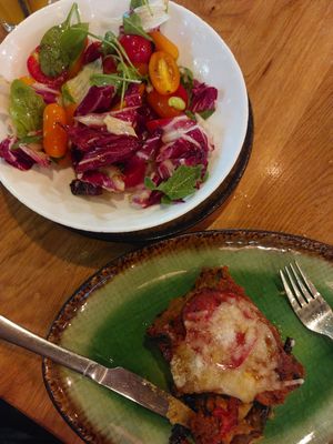 Moussaka and tomato salad at Vegan Garden Budapest in Budapest