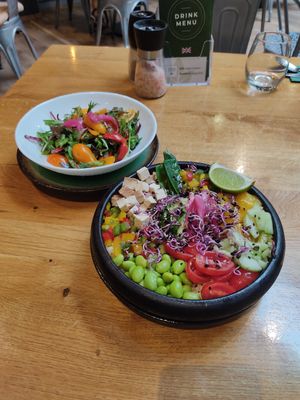 cherry salad and poke bowl at Vegan Garden Budapest in Budapest