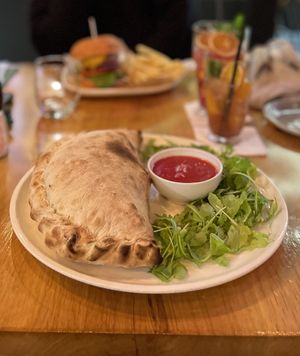 Pizza calzone with spinach  at Vegan Garden Budapest in Budapest