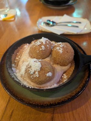 Traditional Hungarian dumplings with sour cream and cinammon at Vegan Garden Budapest in Budapest