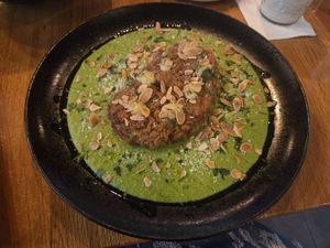 Cauliflower steak with pea puree at Vegan Garden Budapest in Budapest