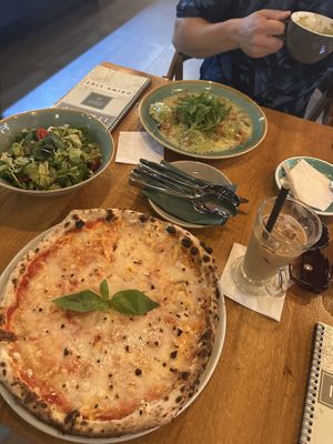 Pizza, ravioli, salad    at Vegan Garden Budapest in Budapest
