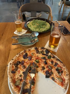 Risotto and pizzaa  at Vegan Garden Budapest in Budapest