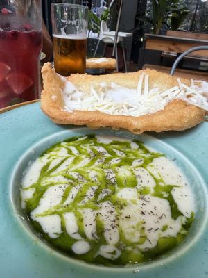 Garlic soup with sour cream, cheese and garlic langosh  at Vegan Garden Budapest in Budapest