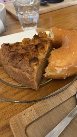 apple cake, and a doughnut  at Fika Coffee in Barcelona