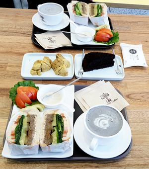 soy burger, black sesame latte and dessert at Fortunate Coffee - 씽푸커피 in Ansan