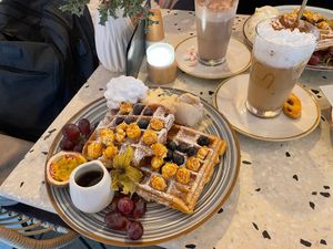 Waffles with fresh fruits and ice cream and toffee latte at Findelkind Café in Esslingen