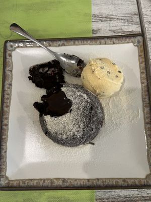 ...warm liquid chocolate lava inside  at Magn'etico Osteria Bio & Veg in Borgo San Lorenzo