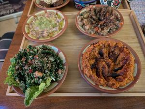 Ful medamas, Baba ganoush, tabbouleh, muhammara at Bistro Habibi in Prague